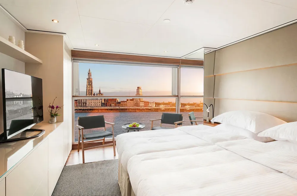 Scenic river view through stateroom window