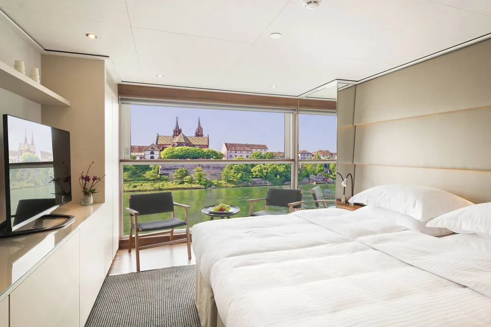 Elegant Riviera Deck stateroom with contemporary furnishings
