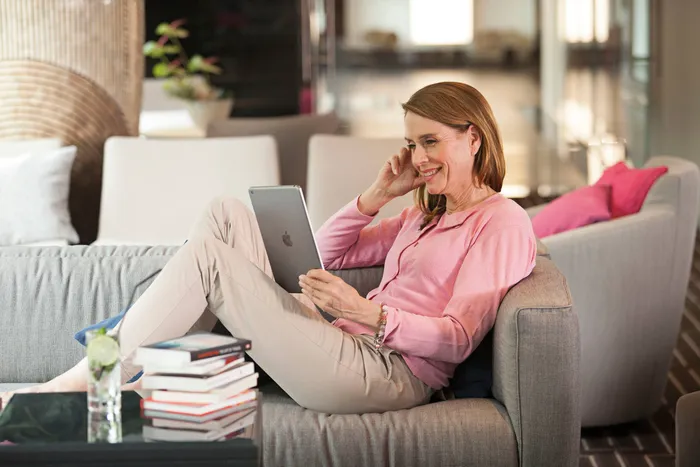 Couple enjoying Wi-Fi on the Sun Deck