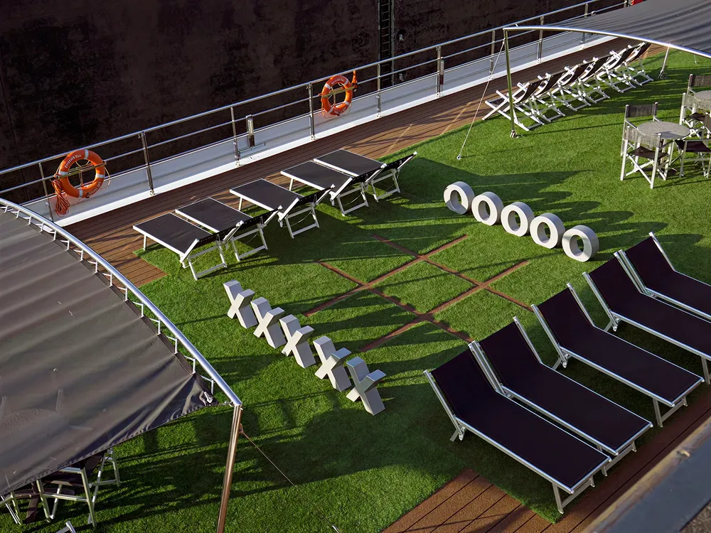 Sun Deck with lounge chairs and panoramic views