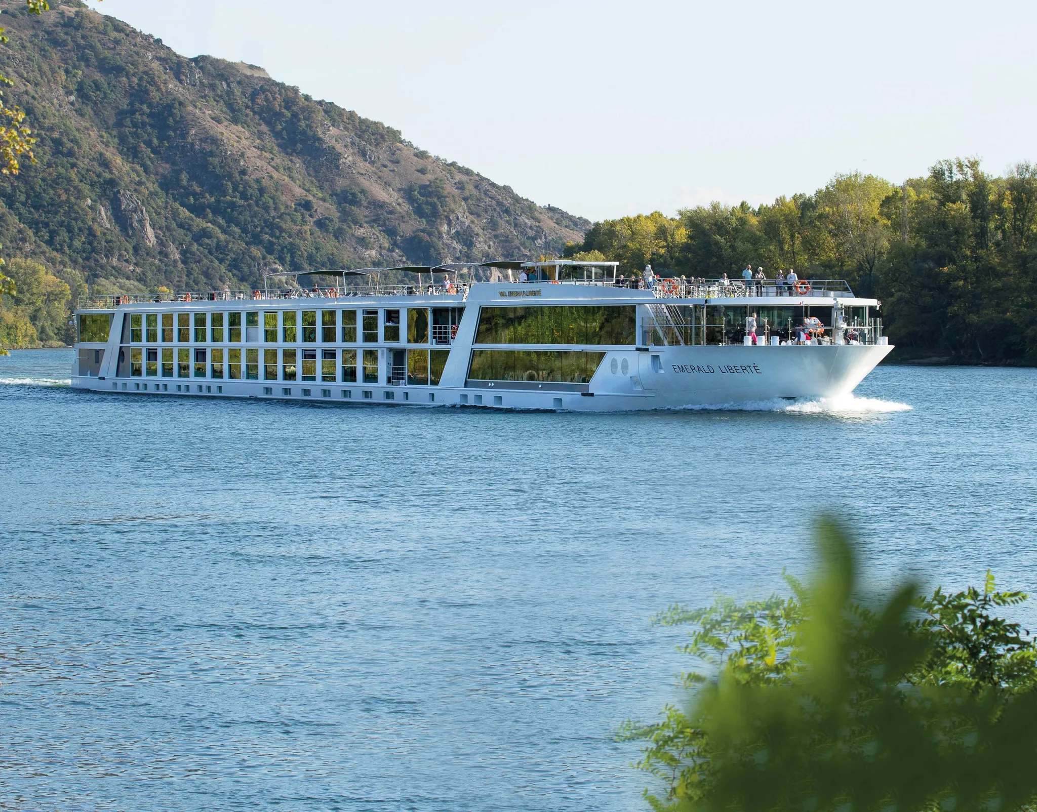 Emerald Star-Ship sailing through scenic European waterways