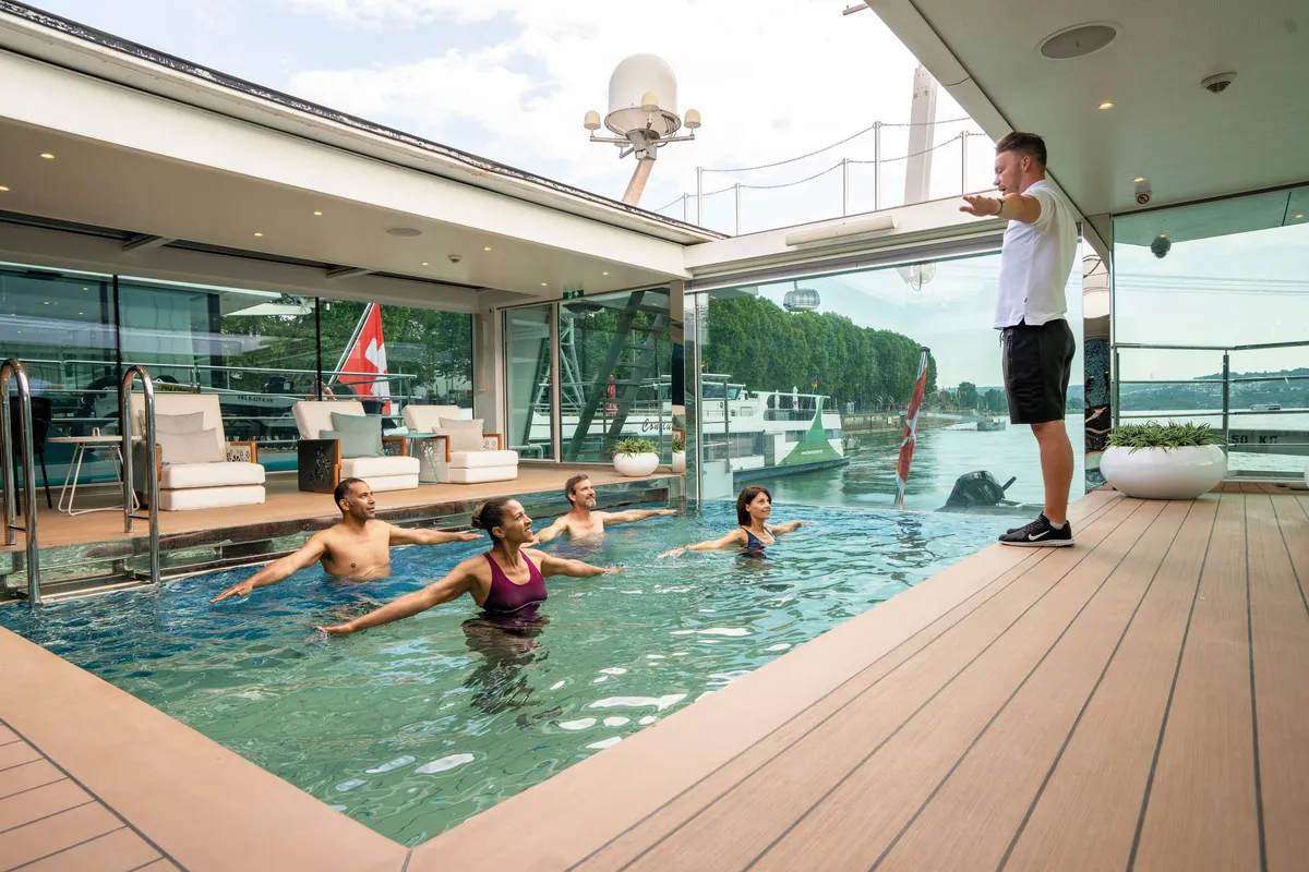 The ship's heated swimming pool with sun loungers